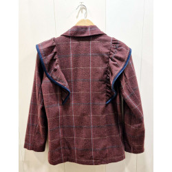 Chaqueta cuello solapa, cierre frontal con botones, manga larga. Estampado de cuadros, detalle volante ribeteado en terciopelo