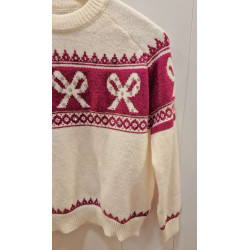 Jersey de cuello redondo, manga larga, con motivo de lazos con lentejuelas.