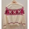 Jersey de cuello redondo, manga larga, con motivo de lazos con lentejuelas.