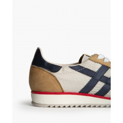 Sneakers con combinación con materiales sintéticos que imitan la tela y el ante, con logo X. Suela de goma sintética dentada de