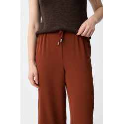 Pantalones cullote de pierna ancha, con cintura elástica y cordón ajustable.