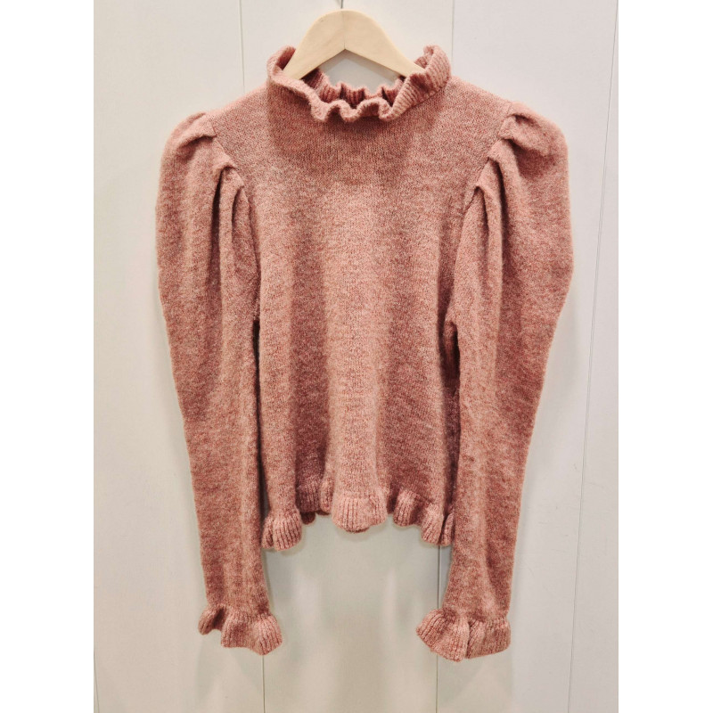 Jersey de cuello alto fruncido y mangas largas con hombros estructorados. Es una prenda versátil que se adapta tanto en ocasione