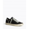 Zapatilla deportiva estilo retro. Cierre mediante cordones de siete pasadas. Corte en combinación de materiales y colores; detal